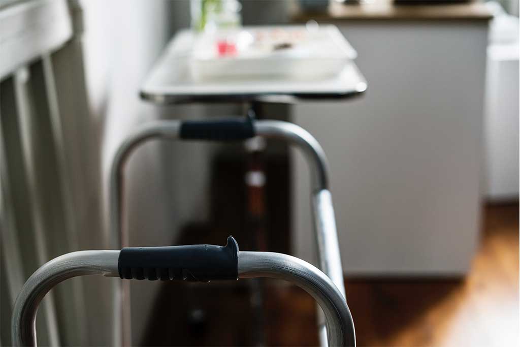 image of walker and nightstand in nursing home